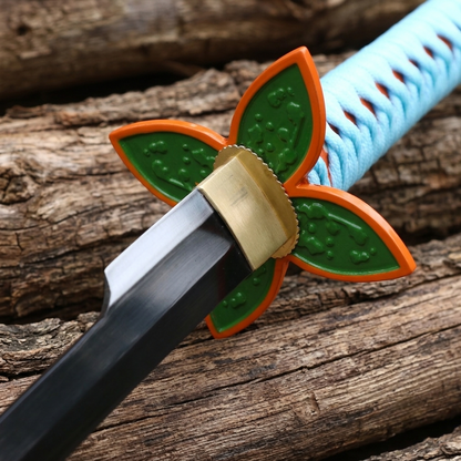 Handmade Shinobu sword blade tip close-up showing the distinctive Stinger piercing design, hand-forged steel